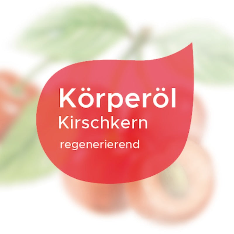 Etikett Körperöl Kirschkern regenerierend in weißer Schrift in rotem Tropfen