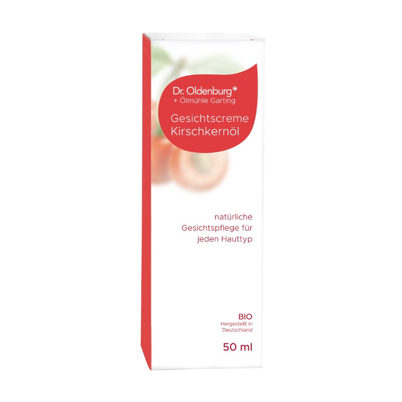 Bio Gesichtscreme mit Kirschkernöl von Dr. Oldenburg und Ölmühle Garting in Kartonverpackung auf weißem Hintergrund