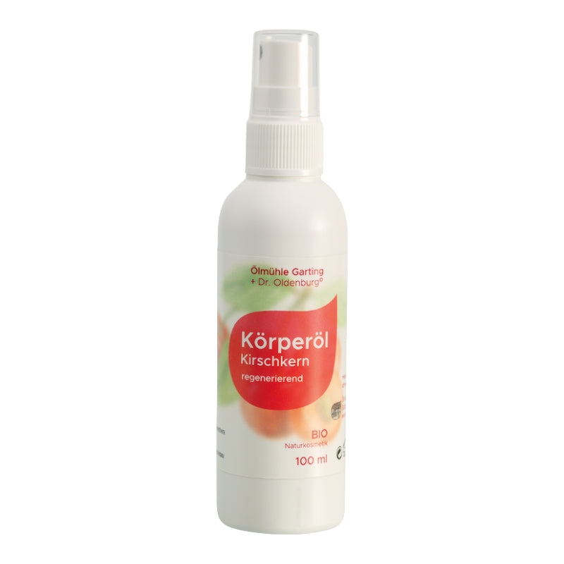 Bio Körperöl mit Kirschkernöl von Dr. Oldenburg und Ölmühle Garting in 100 ml Flasche mit weißem Pumpverschluss auf weißem Hintergrund