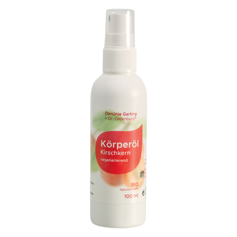 Bio Körperöl mit Kirschkernöl von Dr. Oldenburg und Ölmühle Garting in 100 ml Flasche mit weißem Pumpverschluss auf weißem Hintergrund