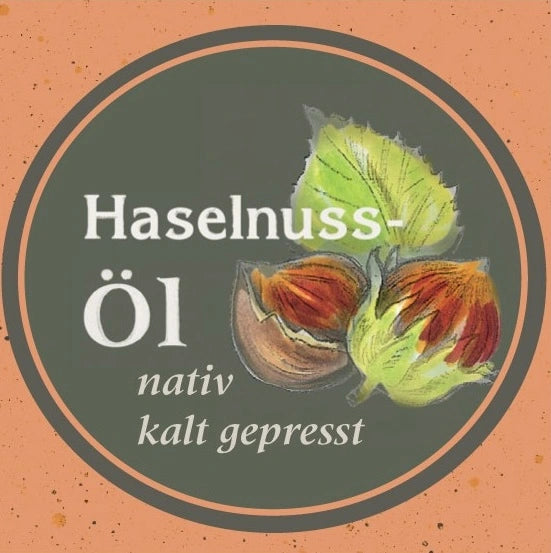 Etikett des Haselnussöl nativ kaltgepresst: Ölmühle Garting mit gezeichneten Haselnüssen