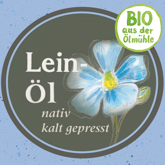 Etikett des Bio Leinoels nativ kaltgepresst: Oelmuehle Garting mit blauer Leinbluete und Bio Siegel der Oelmuehle Garting