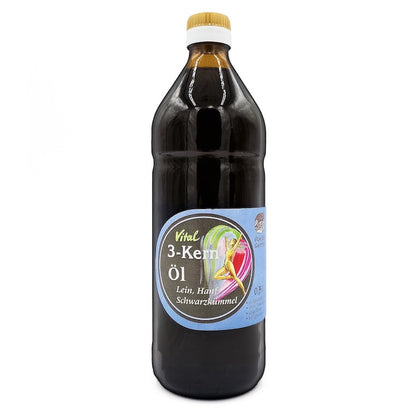 Vitalöl, 3 Kern Öl aus Lein, Hanf und Schwarzkümmelöl nativ kaltgepresst, 750 ml in brauner Glasflasche der Ölmühle Garting mit blauem Etikett auf weißem Hintergrund