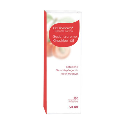 Bio Gesichtscreme mit Kirschkernöl von Dr. Oldenburg und Ölmühle Garting in Kartonverpackung auf weißem Hintergrund