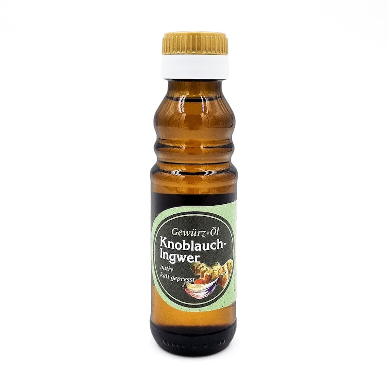 Gewürz Öl Knoblauch Ingwer nativ kaltgepresst, 100 ml in brauner Glasflasche der Ölmühle Garting auf weißem Hintergrund