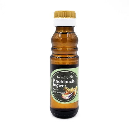 Gewürz Öl Knoblauch Ingwer nativ kaltgepresst, 100 ml in brauner Glasflasche der Ölmühle Garting auf weißem Hintergrund