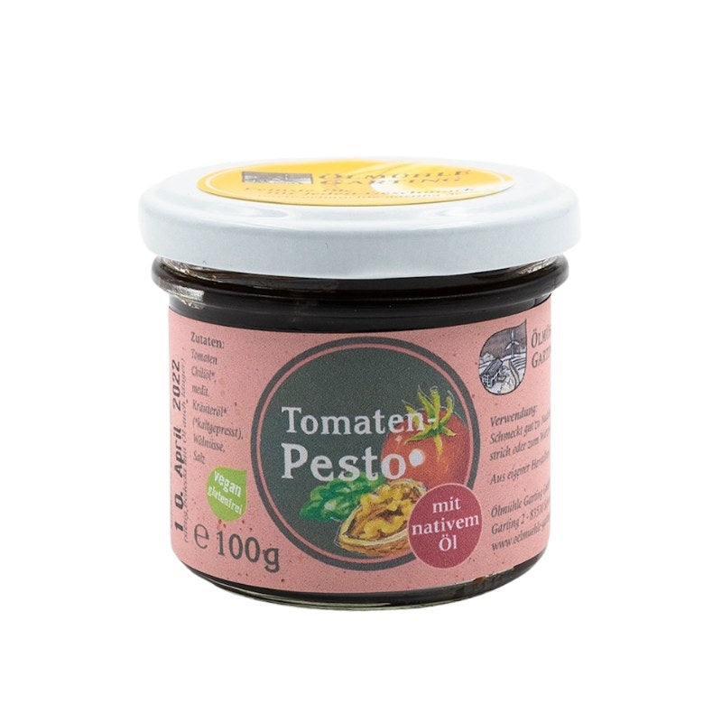 Tomatenpesto mit nativem Öl der Ölmühle Garting, 100g Glas mit hellrotem Etikett auf weißem Hintergrund