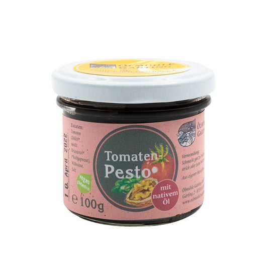 Tomatenpesto mit nativem Öl der Ölmühle Garting, 100g Glas mit hellrotem Etikett auf weißem Hintergrund