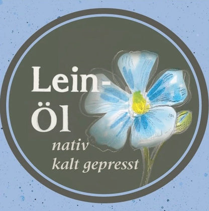 Etikett des Leinoels nativ kaltgepresst: Oelmuehle Garting mit blauer Leinbluete